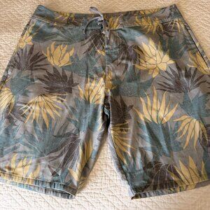 TravisMathew Tropical Board Shorts Size 38 Blue Yellow Floral Swim Trunks